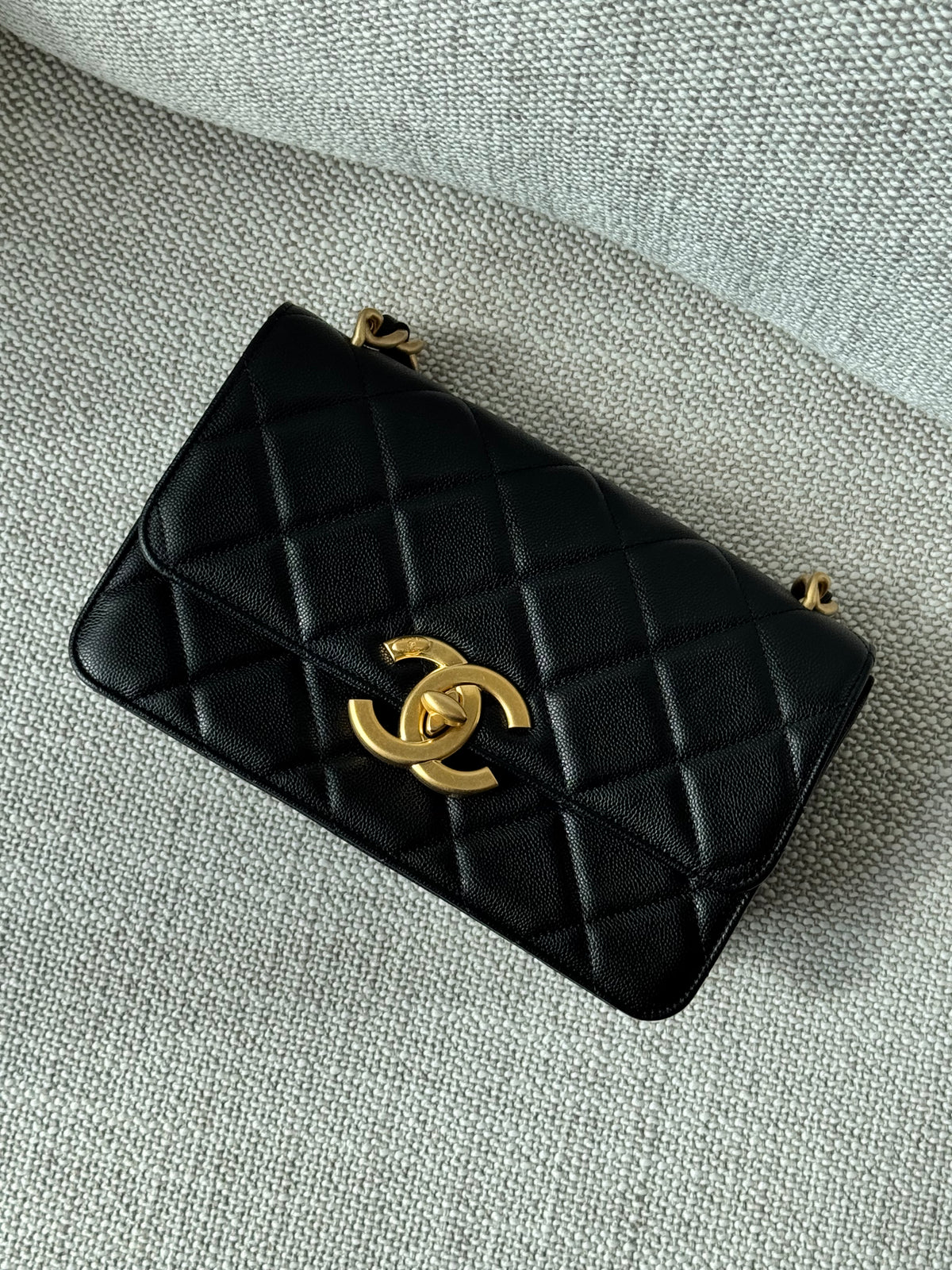 Chanel 24A Flap Bag WOC – Black Grained Calfskin with Gold Hardware
