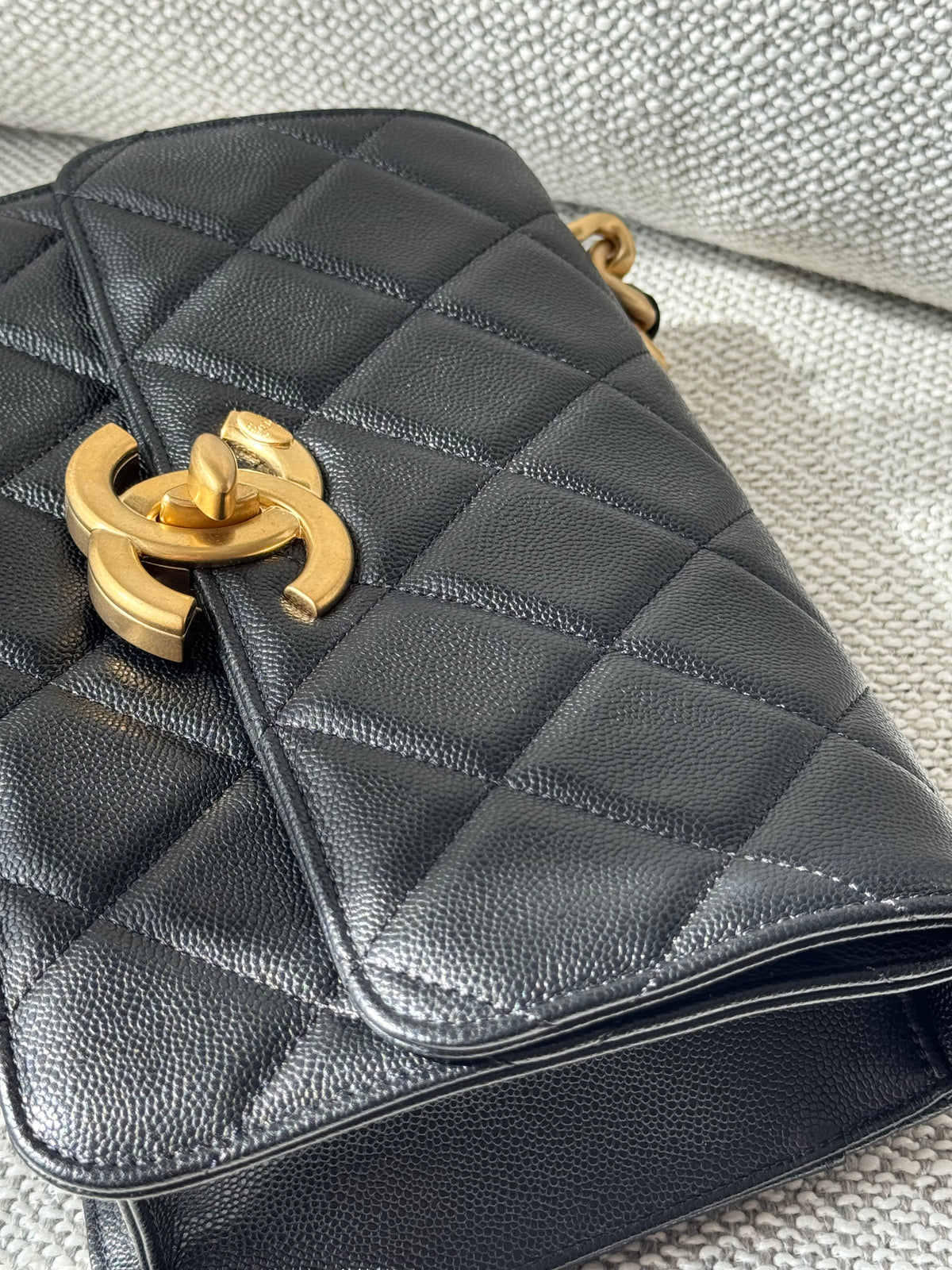 Chanel 24A Flap Bag WOC – Black Grained Calfskin with Gold Hardware
